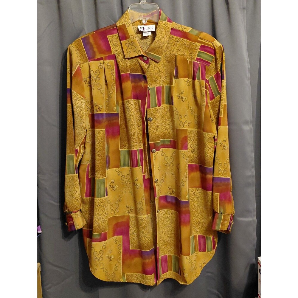 Maggie Sweet button up women's shirt with long tails. Excellent Condition